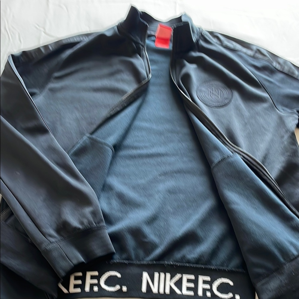 Black Nike  Soccer Jacket Sleek Design with heavy gold-tone zippers